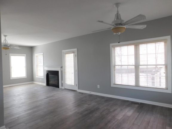 Open floor plan with view to patio, pergola, and jacuzzi