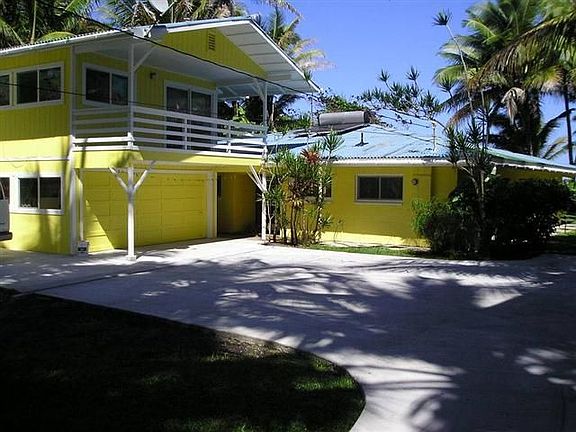 Concrete palm lined driveway