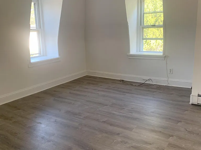 Bright and sunny living room. Can be used as a combination office/living room. Very spacious.
