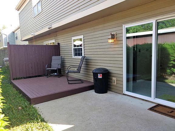 Small back patio, exit to carpot
