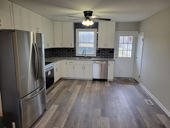 Eat in kitchen with built in microwave and all new stainless appliances