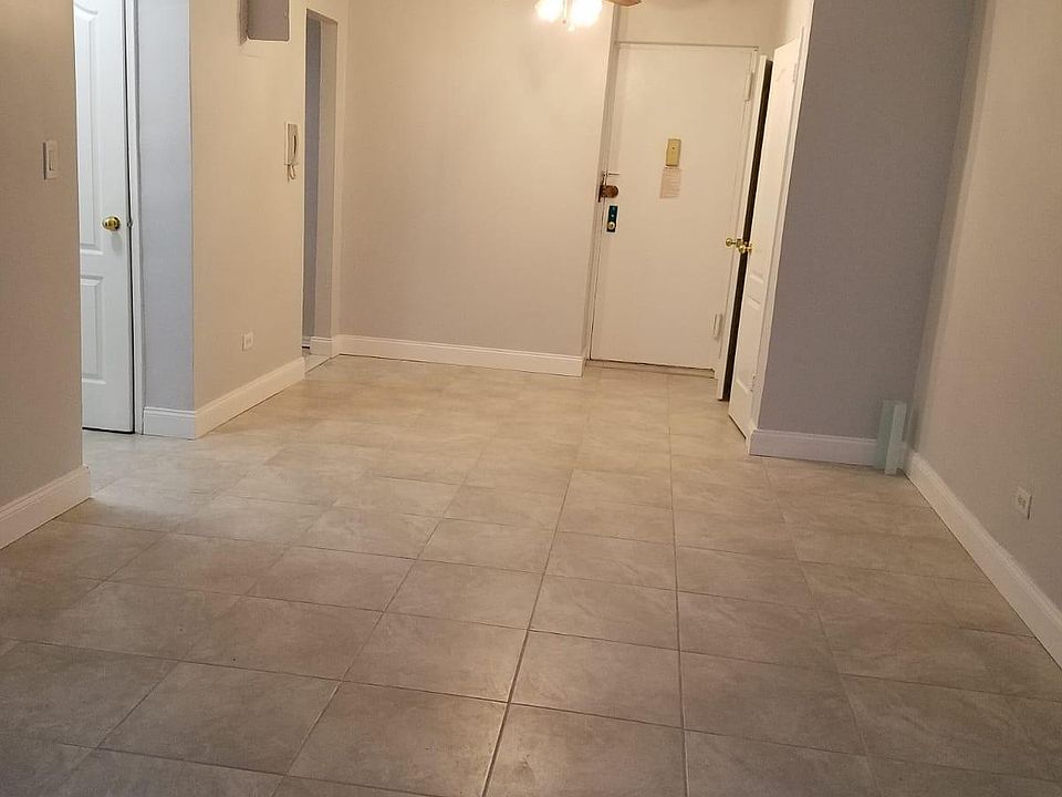 Livingroom (w/Front Door, Kitchen Entrance, and Bathroom/Bedroom Hallway.