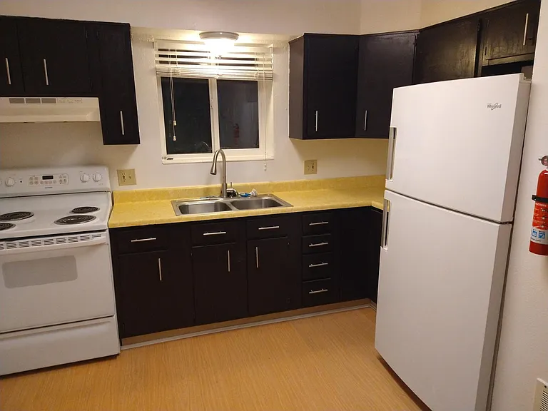 Large Kitchen, newly refurbished, new plumbing, fire extinguisher, Co2 detector, blinds, and vinyl flooring for easy cleaning