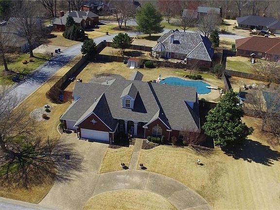 Over half an acre in the middle of Bentonville.  Close to everything!
