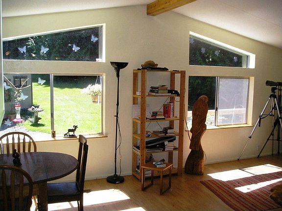 Lots of natural light, picture windows and vaulted ceiling make this living room feel extra large!