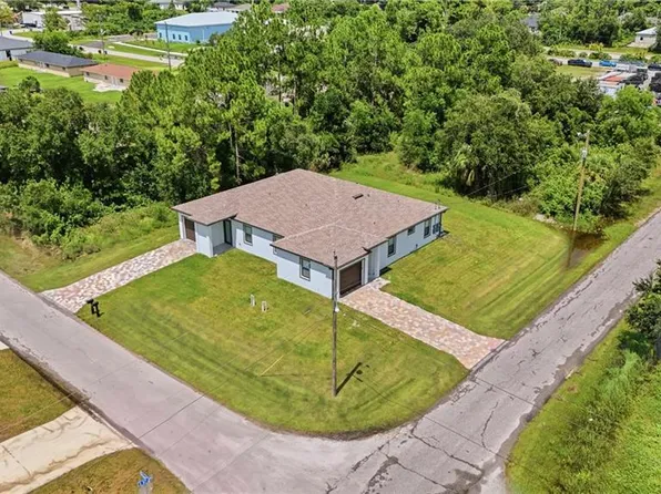 141/143 Gilbert AVE S, LEHIGH ACRES, FL 33973