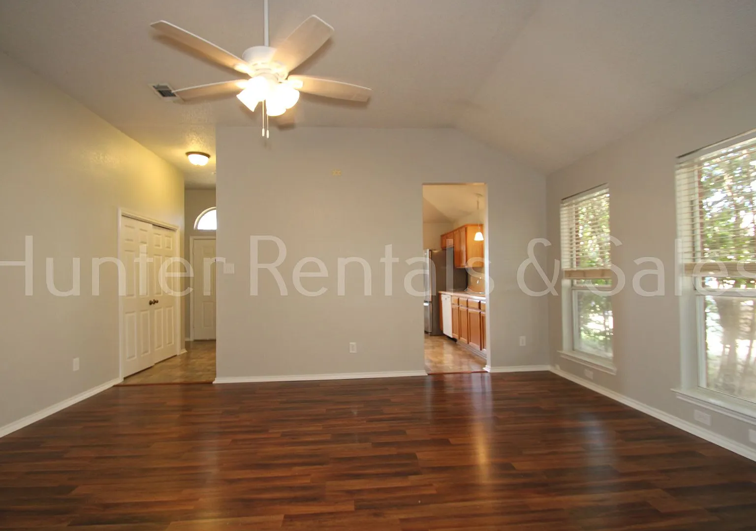 Exceptional Living with Vaulted Ceilings, Cozy Fireplace & Expansive Outdoor Space — Photo 4