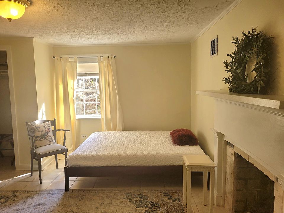 Large bedroom/LR with private outside entrance and adjoining private bath, laundry and kitchen.