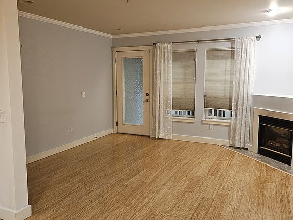 Another view of the living room, close to the backdoor.