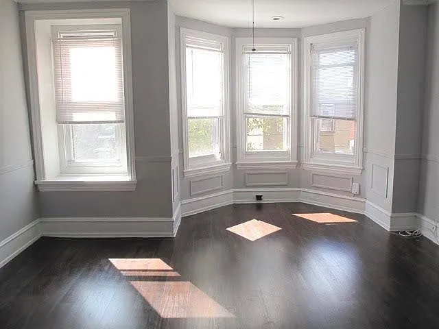Beautiful Bright Bay Window with Molding