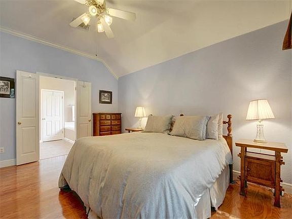 Gleaming wood floors in master are easy to care for and helps keep the allergies at bay.