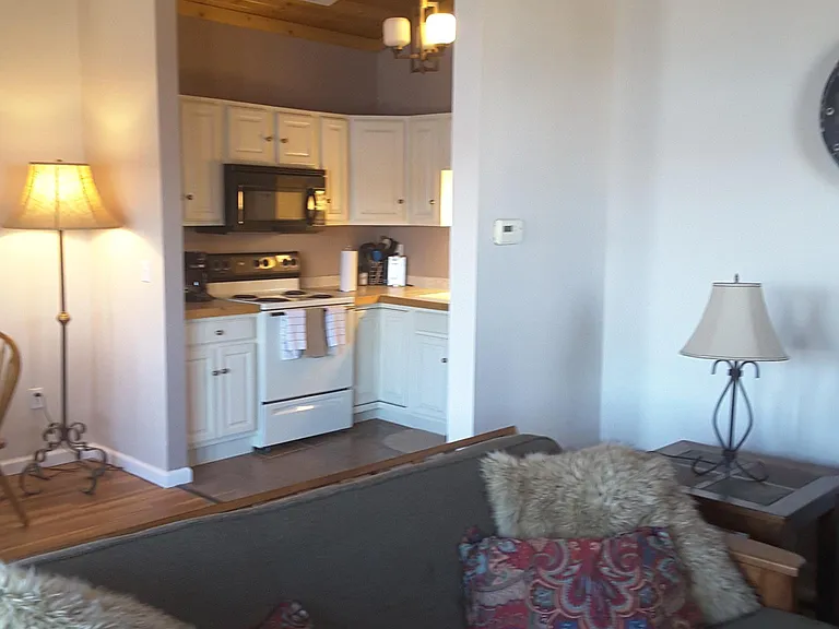 Vaulted ceilings and natural light give this apartment an airy feel.