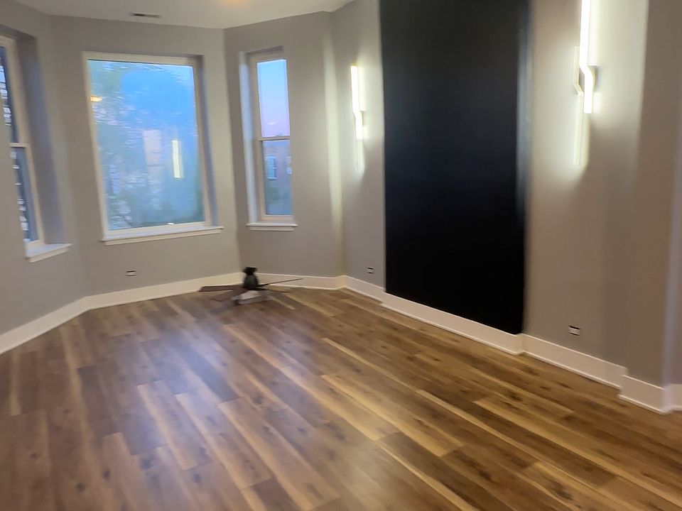 Living Room with accent and lighting wall.