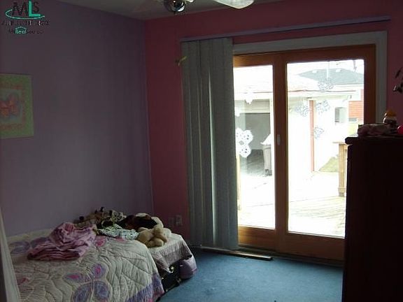 Bedroom With Slide Door Backyard