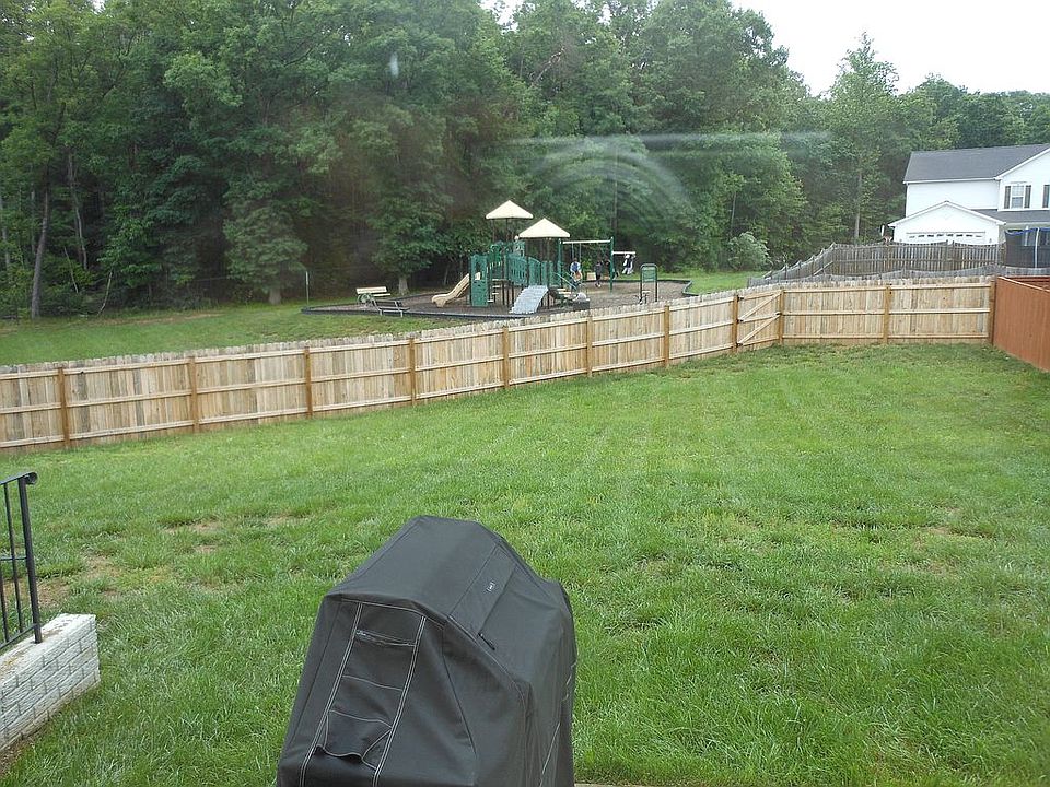 Backyard with a playground 