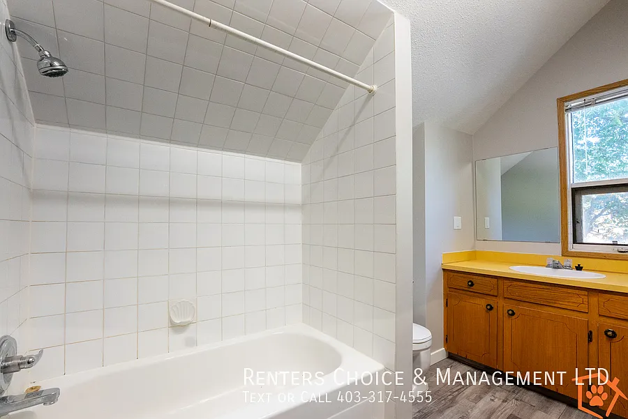 Main Floor Unit With Assigned Parking And Onsite Laundry — Photo 3