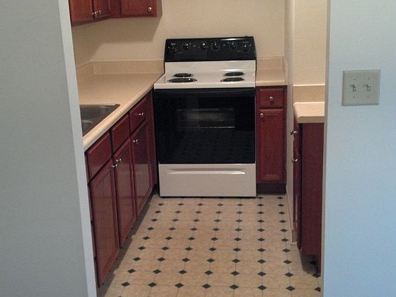 The kitchen - stove included, decent counter space, in-sink