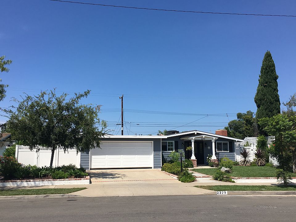 Completely Remodeled Pool Home with Beautiful Curb Appeal