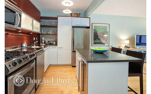 Sold by Douglas Elliman | media 13