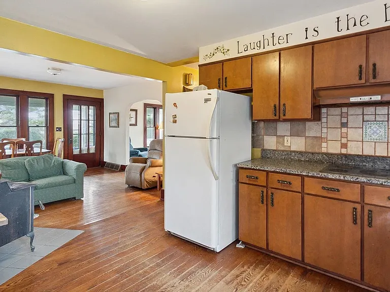 kitchen refrigerator range woodstove dining