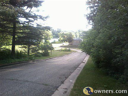 Road to lake along house
