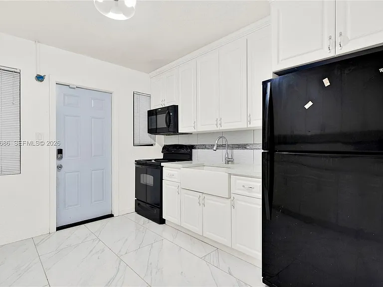 135 NW 121st St — Photo 10