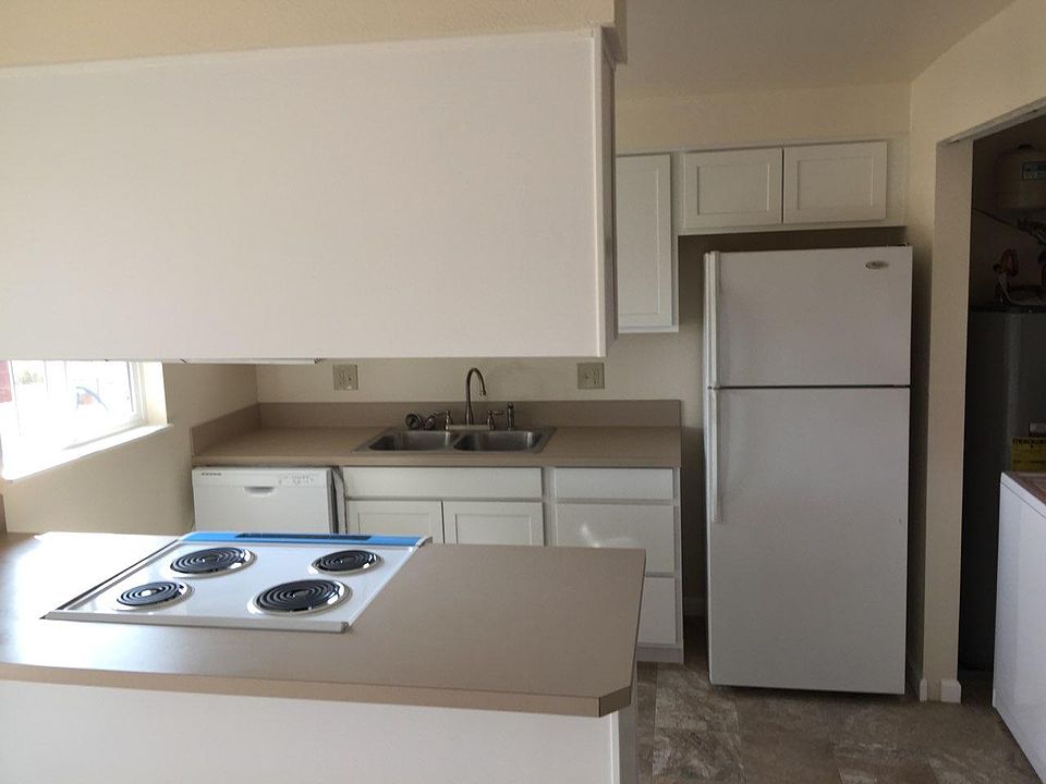 Kitchen has full size washer/dryer in closet