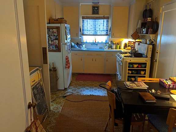 Kitchen includes dinning area