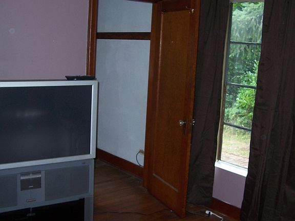 downstairs bedroom with walk-in closet
