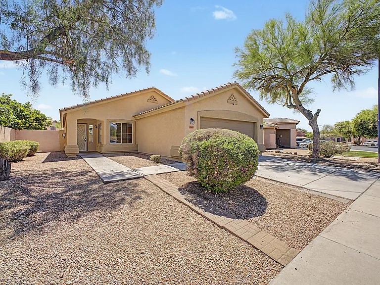 7043 W Phelps Rd — Photo 2