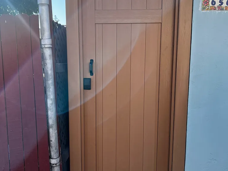New vinyl gate door