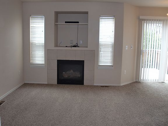 LIVING ROOM WITH GAS LOG FIR