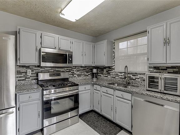 5th image of 5160 Arrowind Rd NW