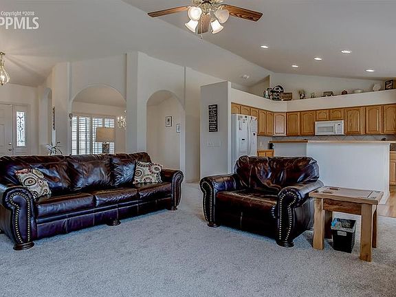 Living room looking into the kitchen.
