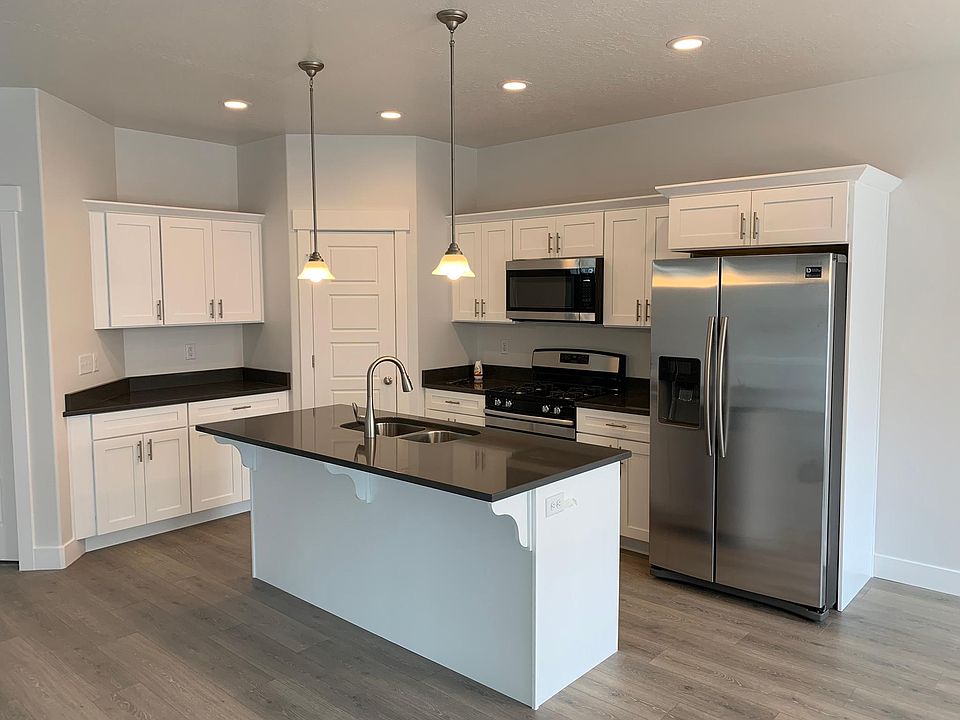 Upgraded cabinets and counter-top. Gas stove. Refrigerator included.
