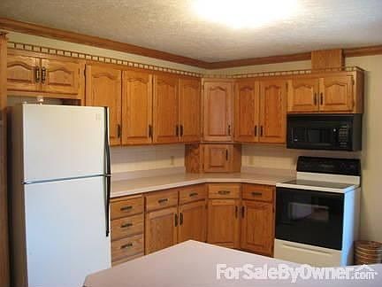 Updated Kitchen
						:
						Fully updated in 2000, all appliances included in sale of home
