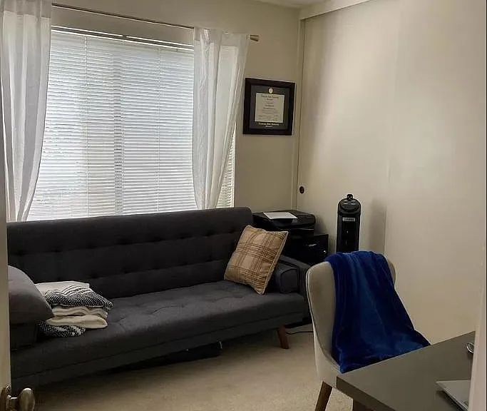 Downstairs guest bedroom / office with closet - staged