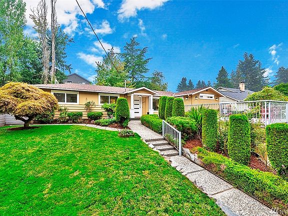 This 4 bedroom rambler sits on a gentle rise, above street level.