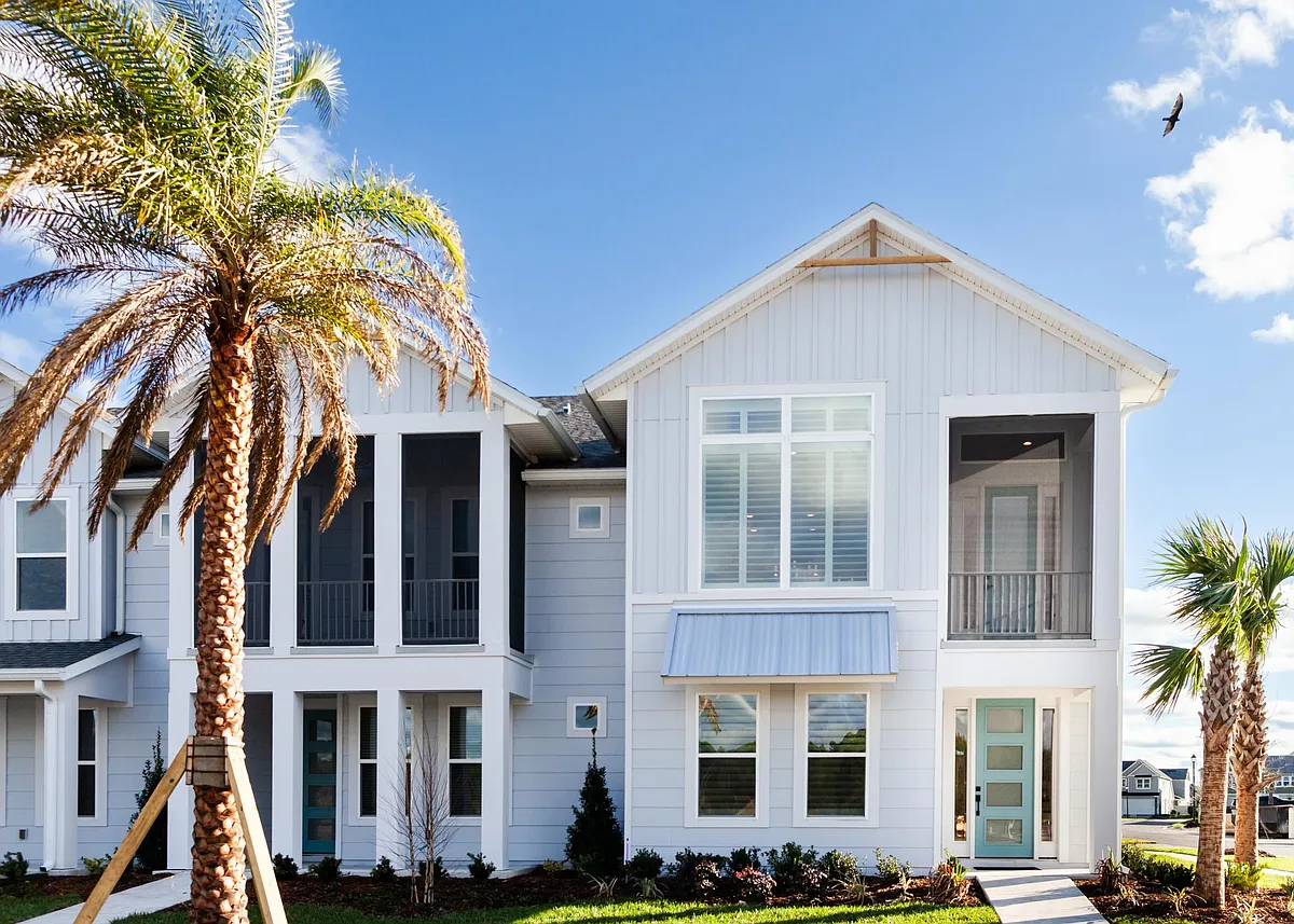 Tastefully designed brand new end unit with stunning LVP and plantation shutters throughout. - 40 Seaport Ln