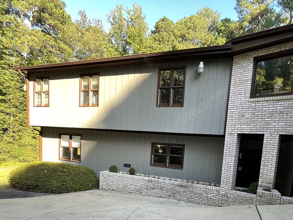 This photo shows the apartment from the drive onto the property. The apartment is one story ... on the first floor of the building.