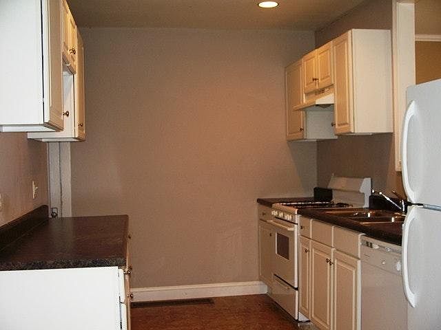 kitchen with white cabinetry