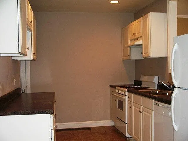 kitchen with white cabinetry