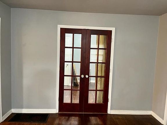 Door to downstairs bedroom from the living room