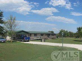 Front of Home with 5 Acres