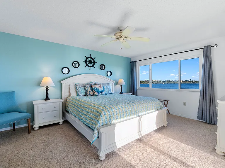 Wake up to spectacular views of the Intracoastal Waterway from the master bedroom. Featuring a California-King-size bed, a walk-in closet, a walk-in shower, and a separate sink and vanity.