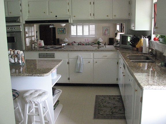 Large family room shown from kitchen