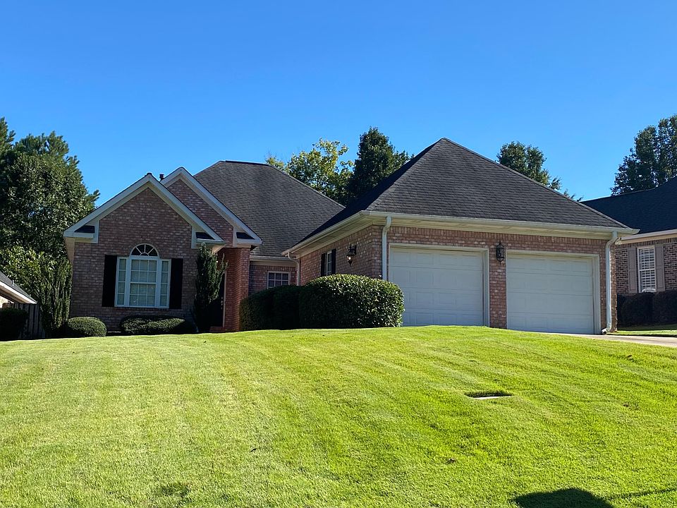 Stately all brick home with 2 car attached garage