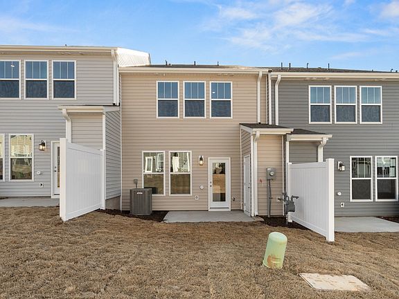 2 story townhome with large owner s suite, 2 car parking pad and patio