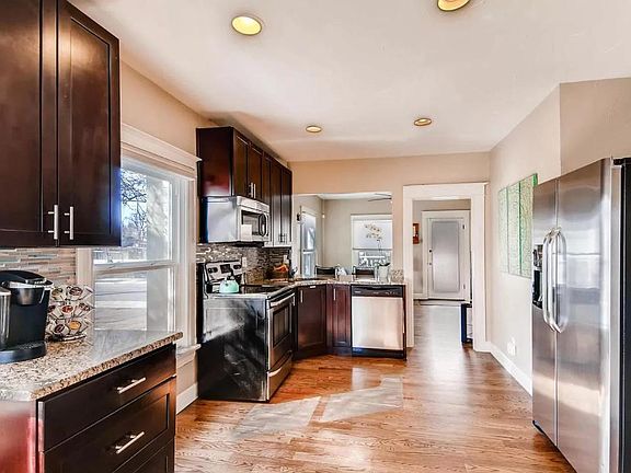 Open Kitchen with granite counter tops and stainless appliances