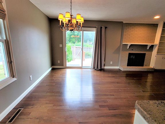 Dining/living with fireplace.